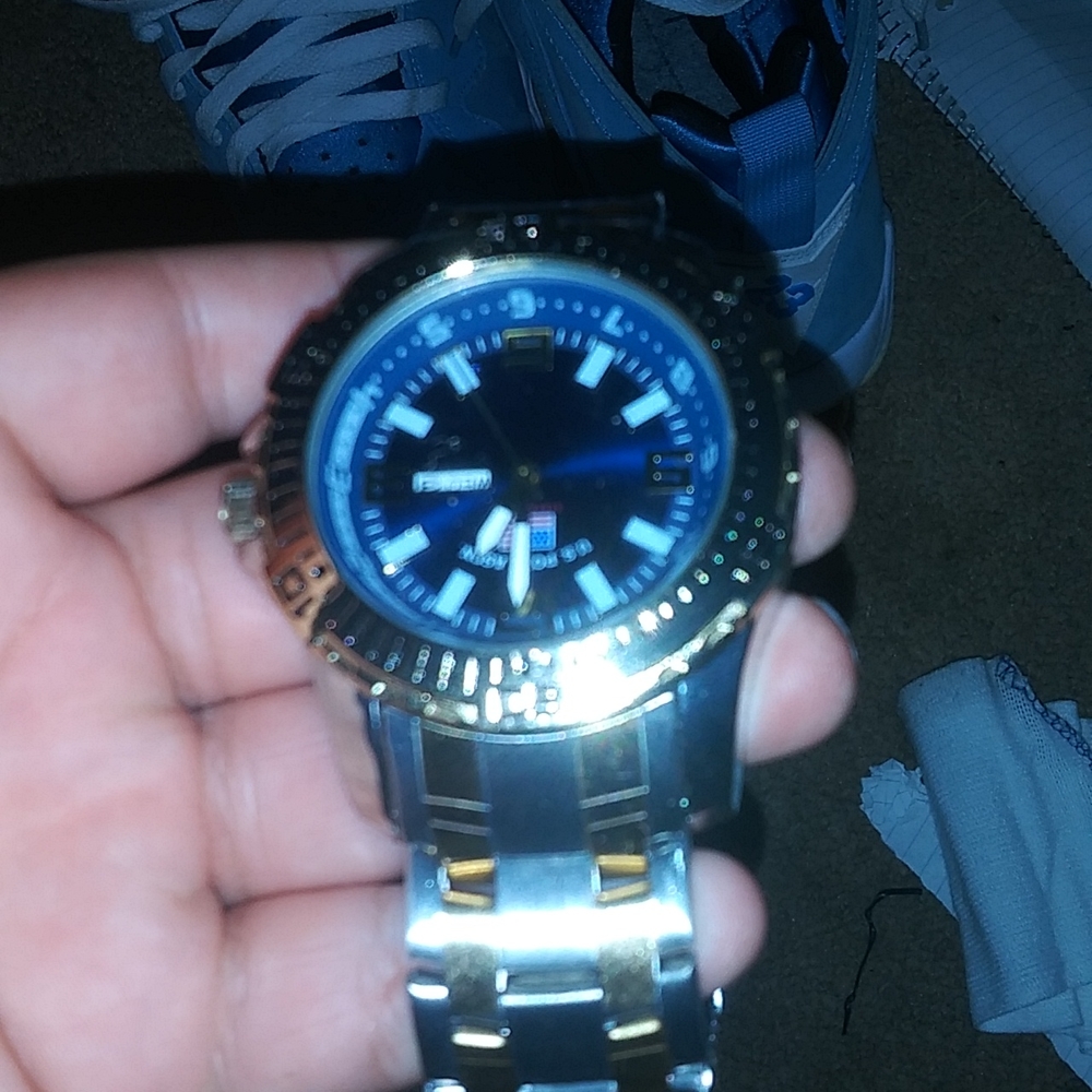 Silver and gold watch pick up only
